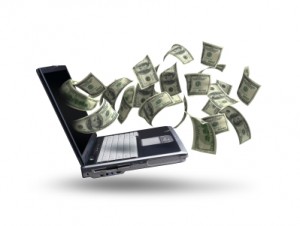 pieniądze wylatujące z ekrana komputera